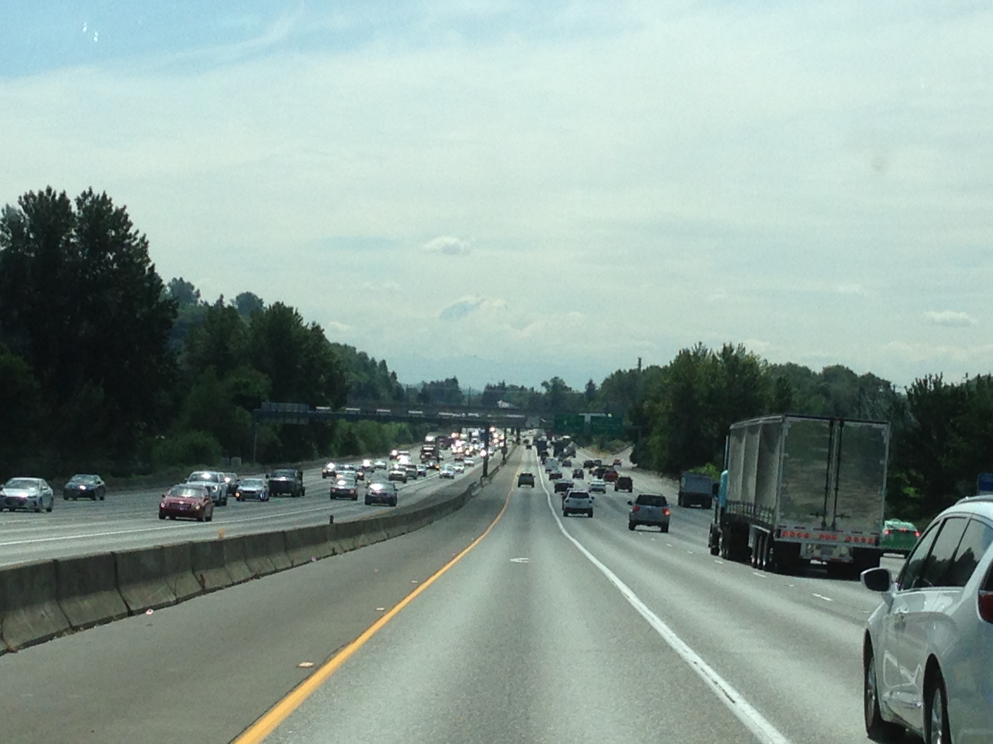 Mount Rainier's Cone Peeking Through the Clouds.